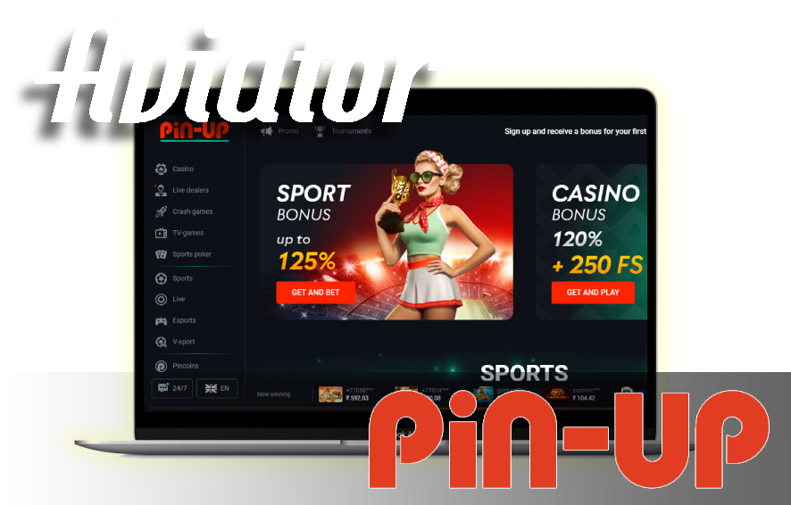 A laptop displaying casino home page with logos of Aviator game and Pin Up